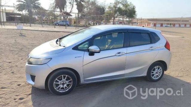 Honda fit hibrido.2015.impecable.