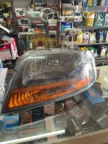 Optico izquierdo aveo hatchback con detalle