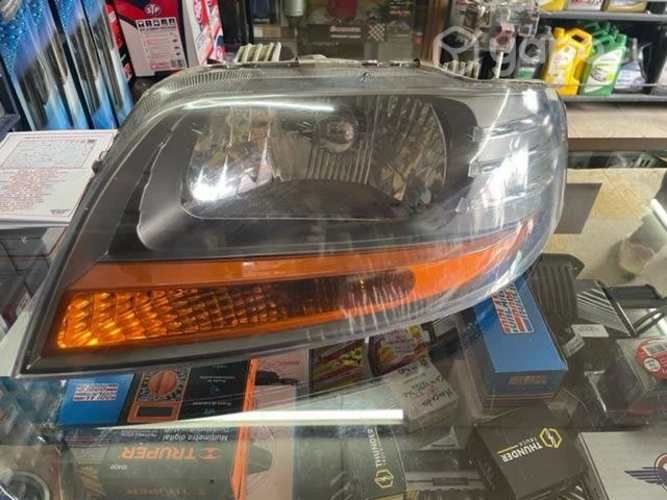 Optico izquierdo aveo hatchback con detalle