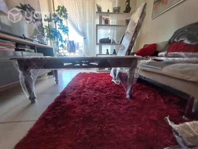 Mesa de centro y arribo de madera