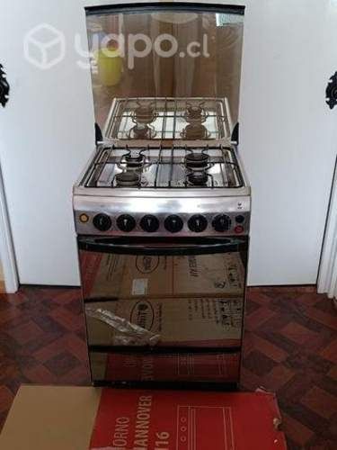 Estufa cuatro platos en excelente estado
