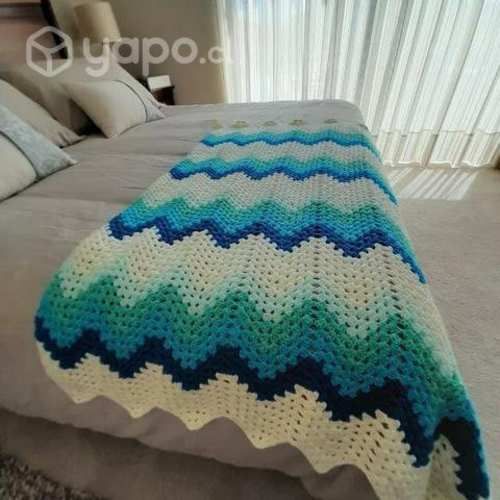 Manta o piecera tejida