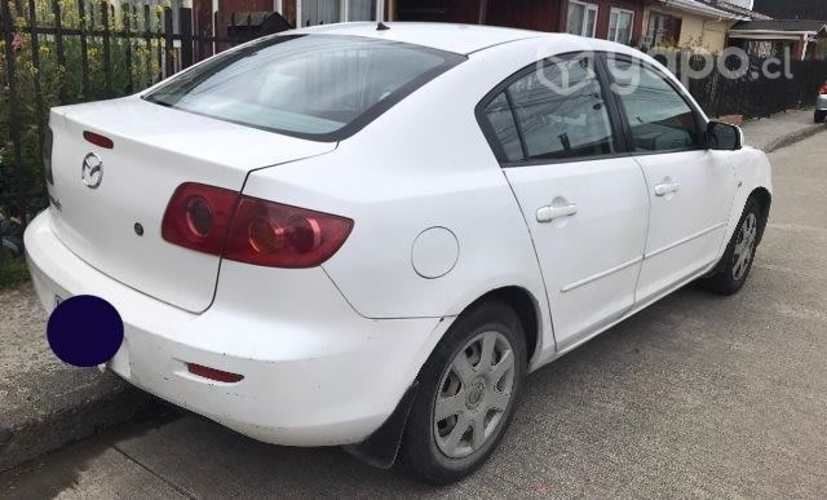 Vendo  MAZDA3 2006 al dia. Conversable