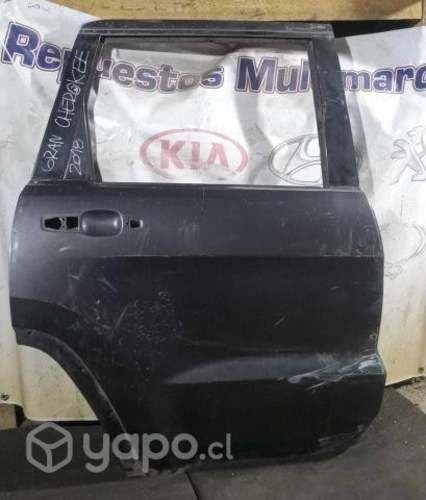 Puerta trasera derecha jeep gran cherokee