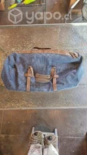 Maxi bolso de mezclilla con detalles en cuero