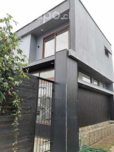 Casa con local comercial