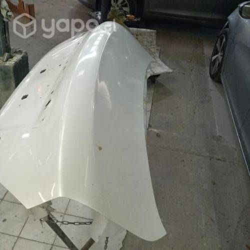 Tapa maleta Nissan versa 2016