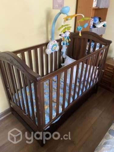 Cuna mecedora de madera