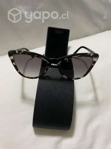 Lente de sol Prada