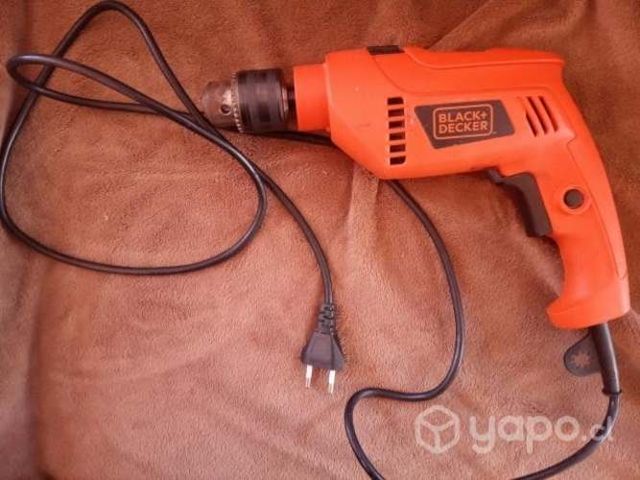 Taladro percutor prácticamente nuevo