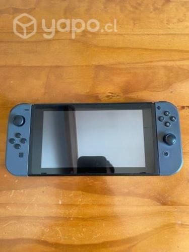 Nintendo Switch con control alambrico y 3 juegos