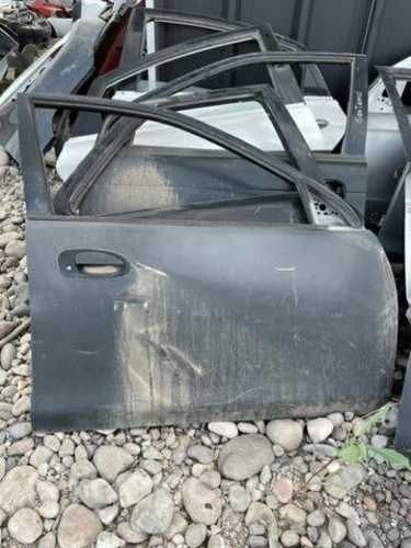 Puerta delantera derecha artis