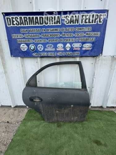 Puerta trasera derecha artis