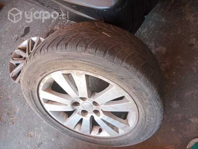 Subaru tribeca llanta original con neumatico envio