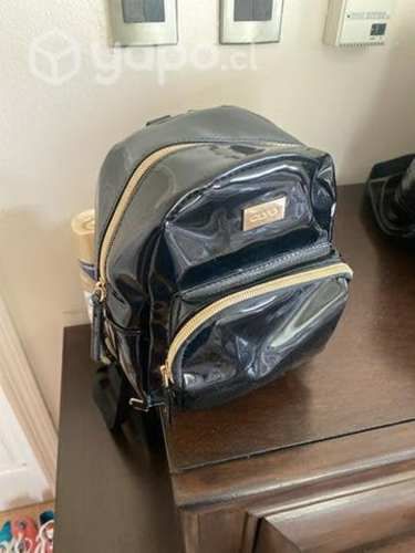 Mochila pequeña tipo cartera