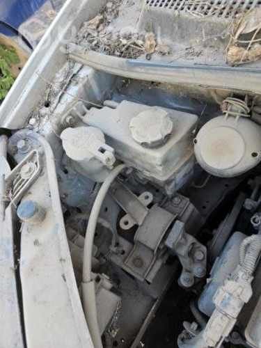 Desposito de agua kia morning 2010