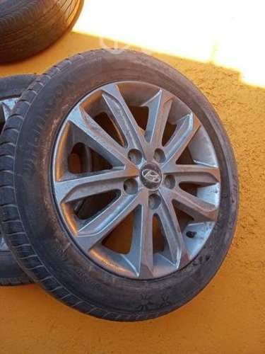 Hyundai elantra 2015 aro 17 original con neumatico