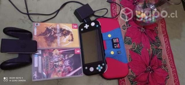 Switch Lite con accesorios y juegos