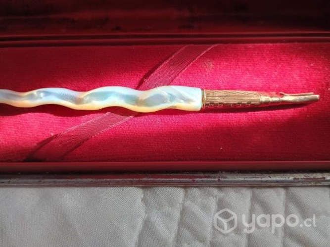 Pluma enchapada en oro