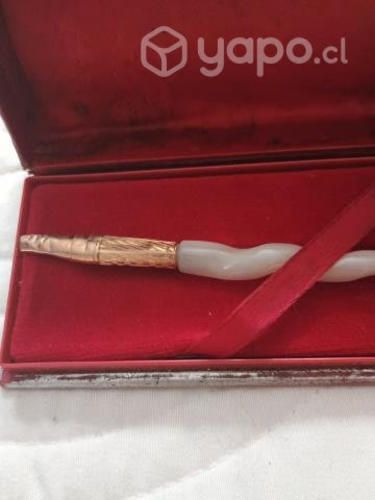 Pluma enchapada en oro