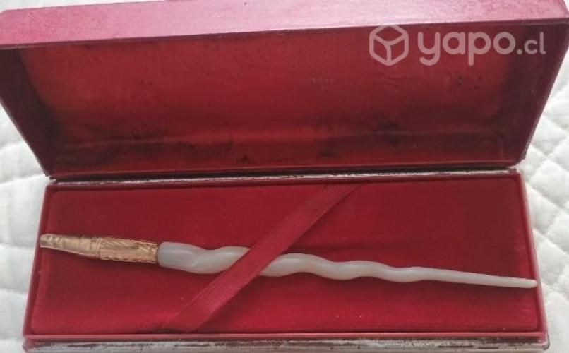 Pluma enchapada en oro