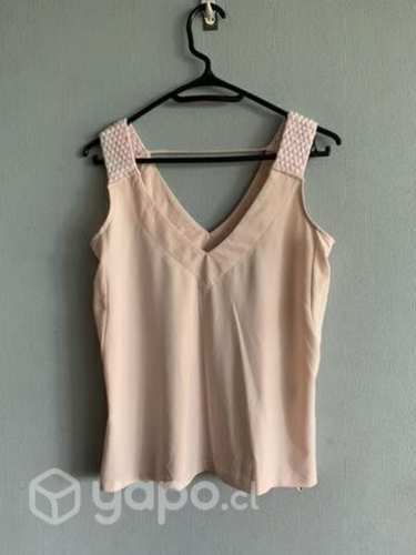 Blusa IO, un básico en talla XS.