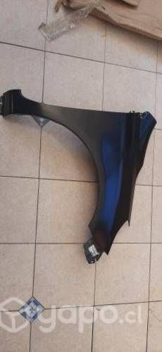 Tapabarro Nissan versa 2014