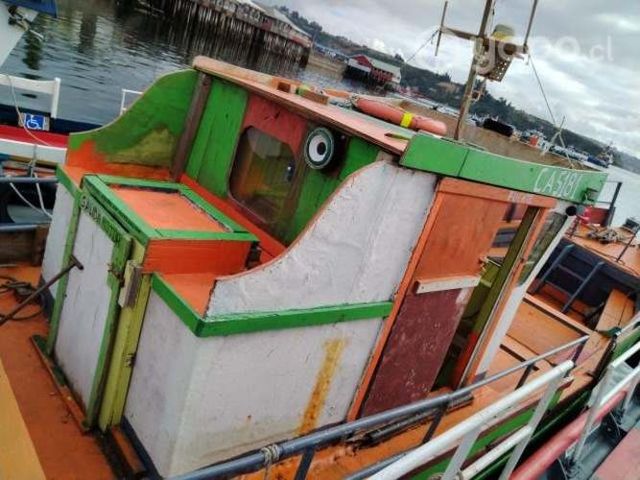 Lancha madera revestida en fibra