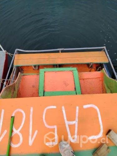 Lancha madera revestida en fibra