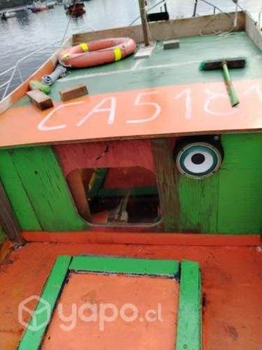 Lancha madera revestida en fibra