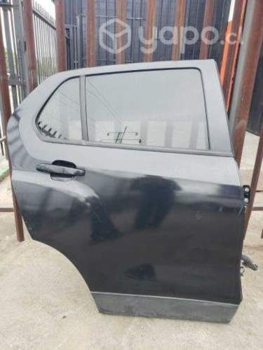 Puerta completa trasera rh tracker 1.8 2017