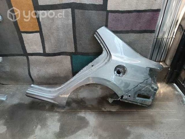 Kia Soluto costado trasero izquierdo / cuarto de p