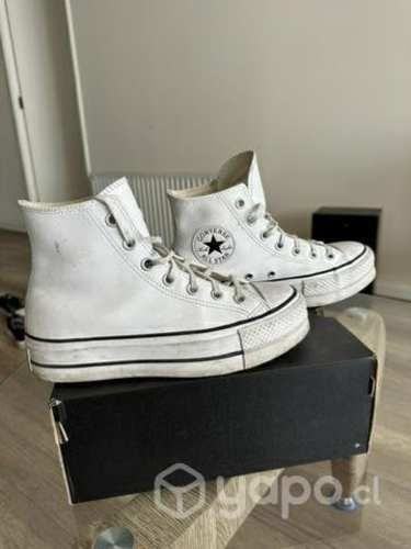 Converse blancas de cuero con plataforma