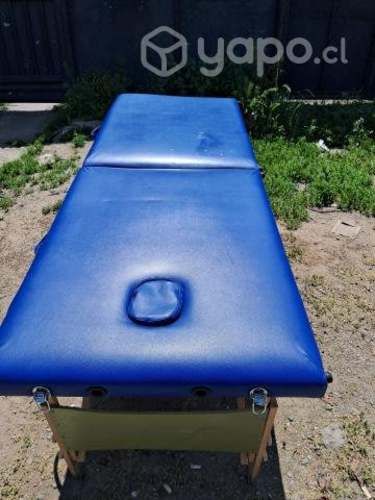 Mesa plegable para masajes.