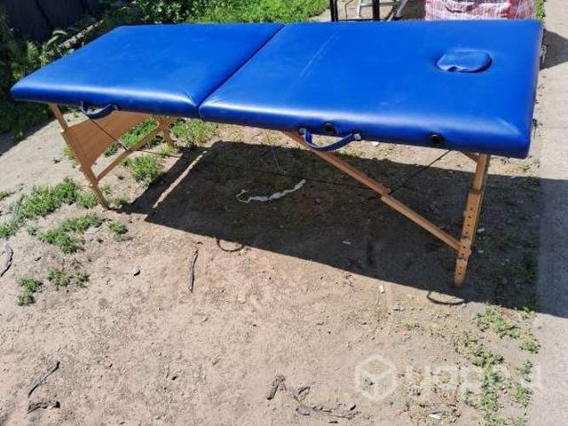 Mesa plegable para masajes.