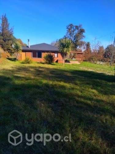 Vendo parcela 5000m2 con casa y quincho