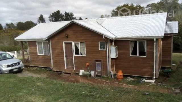 Vendo parcela con casa