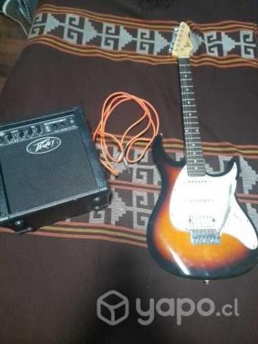 Guitarra electrica peavey con amplificador