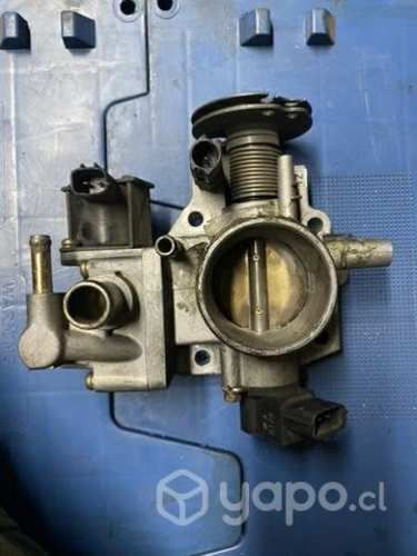 Cuerpo de aceleración Mazda 323