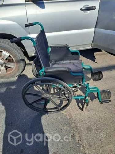 Silla de ruedas impecable