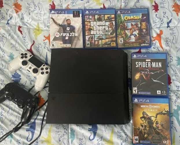 Ps4 + 2 controles+ 5 juegos