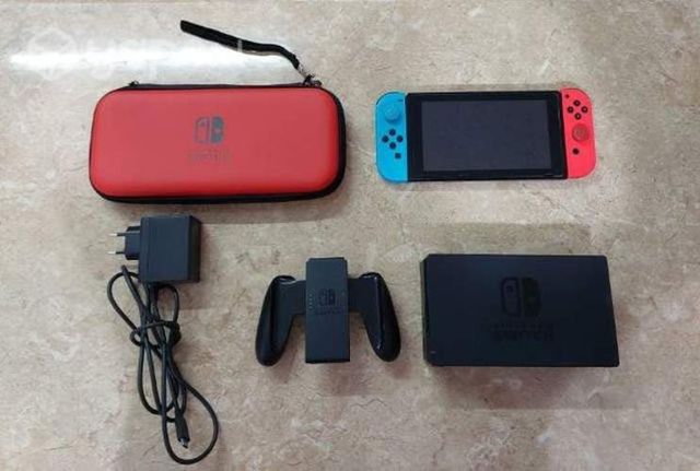 Switch perfecto estado más estuche para transporte