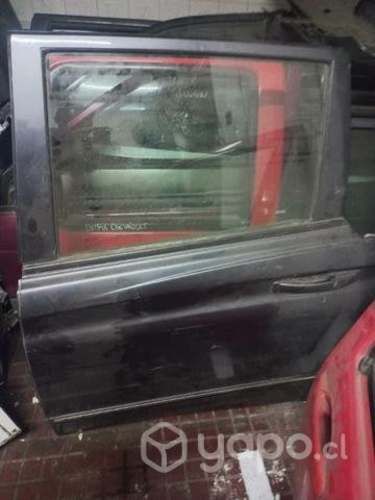 Puerta trasera izquierda samgyon actyon 2016