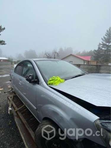 Tapabarro kia rio jb 2011