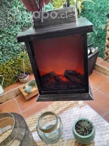 Farol ,imitación de chimenea,con luces y movimient
