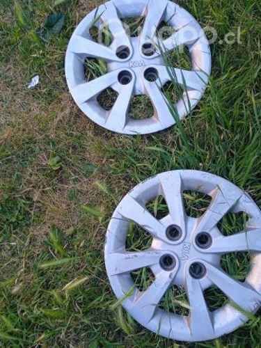 4 neumaticos con sus llantas y a parte 4 tapa