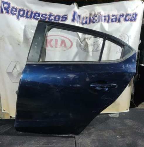 Puerta trasera izquierda Mazda 3 sin vidrio