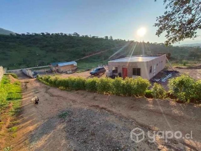 Terreno con casa rol propio