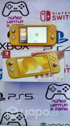 Nintendo switch Lite en buen estado con juegos