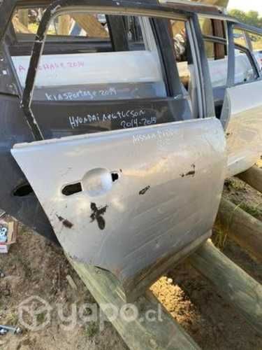 Puerta Nissan tidda 2012